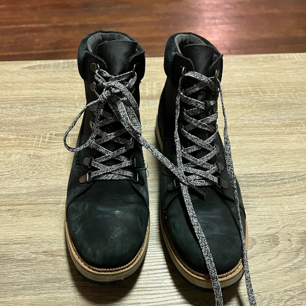 TOMS, black leather mesa boots. Water proof! In good condition
